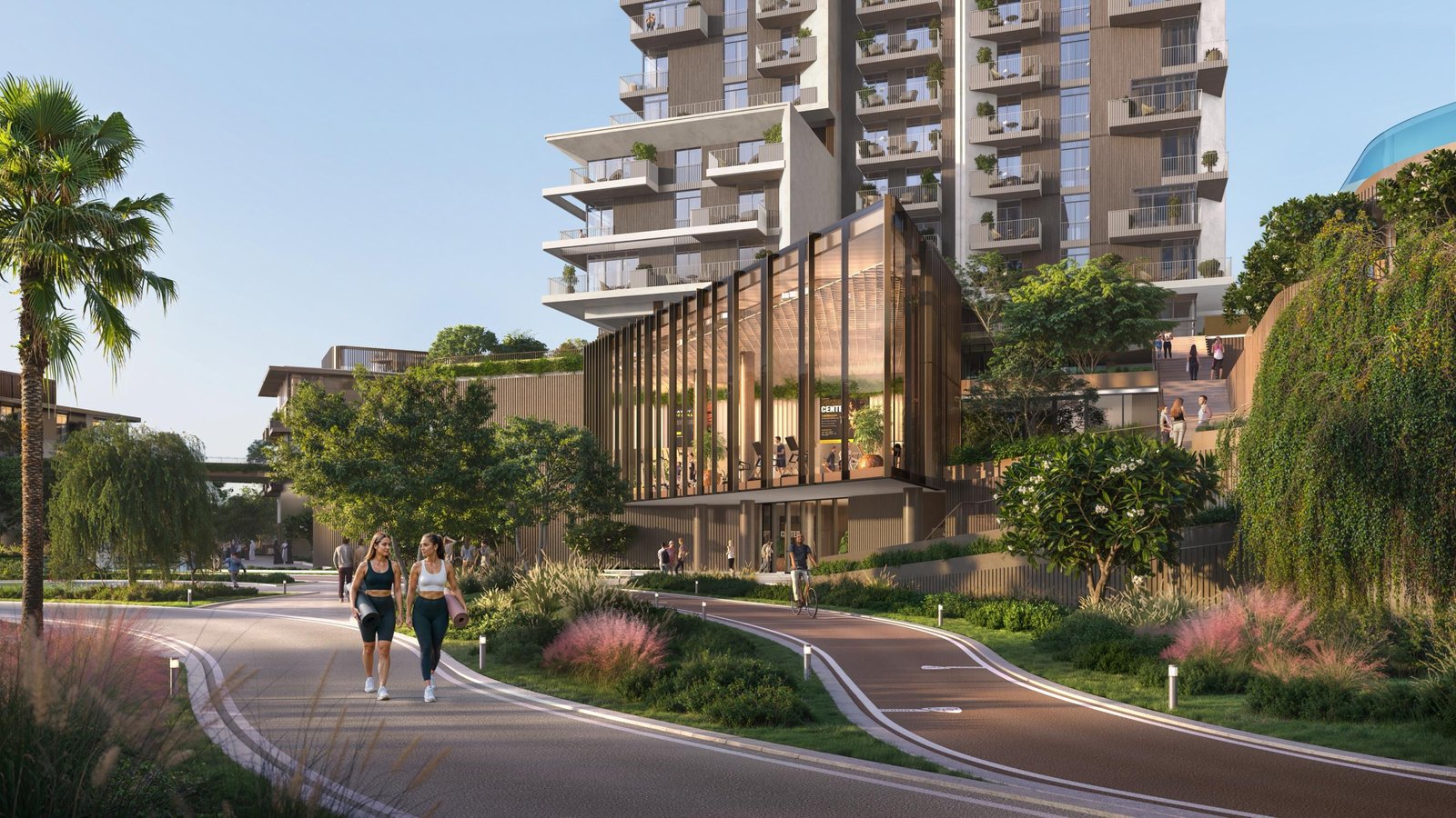 Rise by Athlon Dubailand Dubai tower skyline view surrounded by lush greenery and community wellness amenities